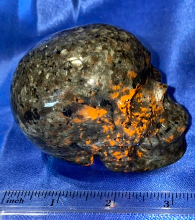 Yooperlite Stone Skull 2 (UV Reactive) - Halloween decor, spooky polished gray black stone sculpture glows red under blacklight