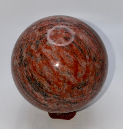 Red Sesame Jasper Sphere 1m - polished red, cream, black, and gray patterned sculpture