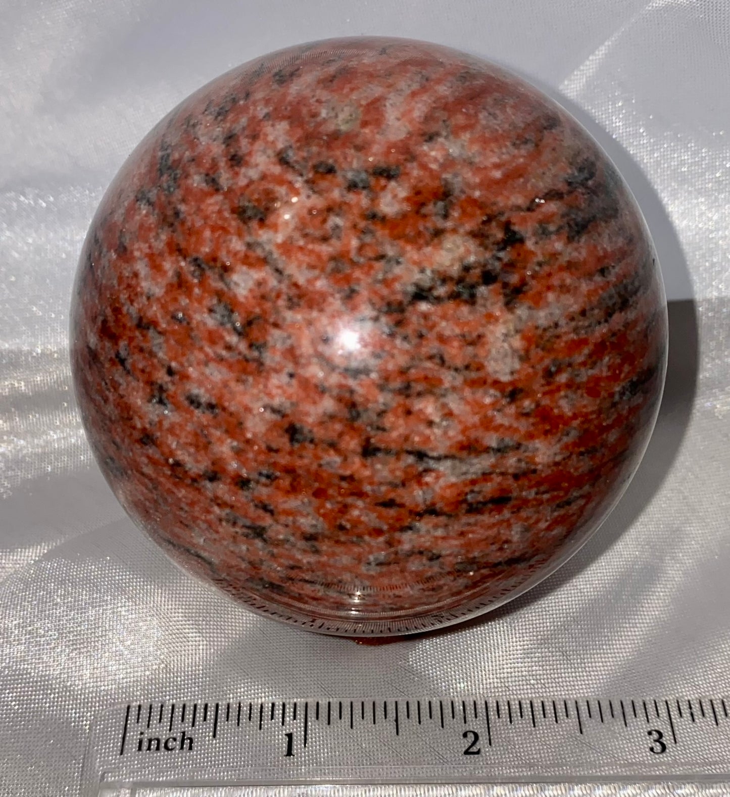 Red Sesame Jasper Sphere 1m - polished red, cream, black, and gray patterned sculpture