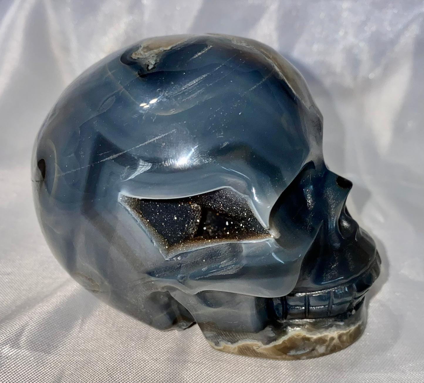 Large Volcano Agate Skull (UV Reactive) 3 - Halloween decor, spooky polished stone sculpture crystalline druzy pockets, glows in blacklight