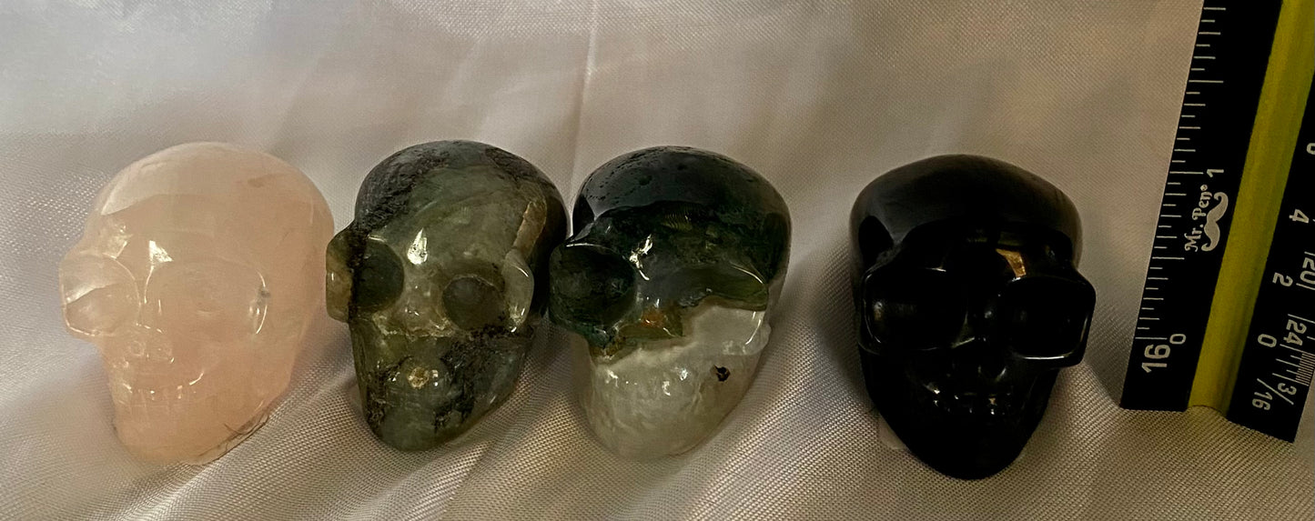 Gemstone Skull Figurines - Halloween decor, spooky multicolored polished sculpture