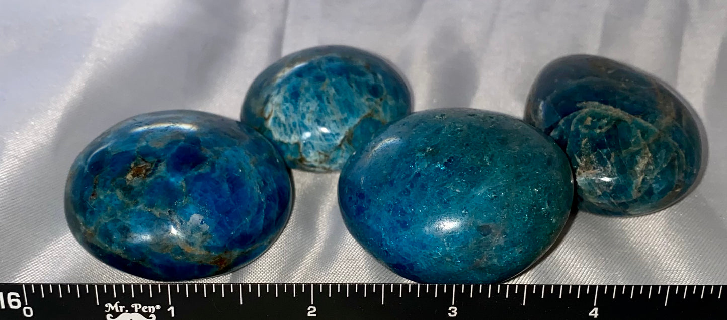 Blue Apatite Palm Stone 1...4 - polished blue flash stone sculpture