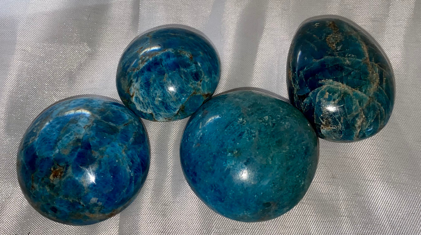 Blue Apatite Palm Stone 1...4 - polished blue flash stone sculpture