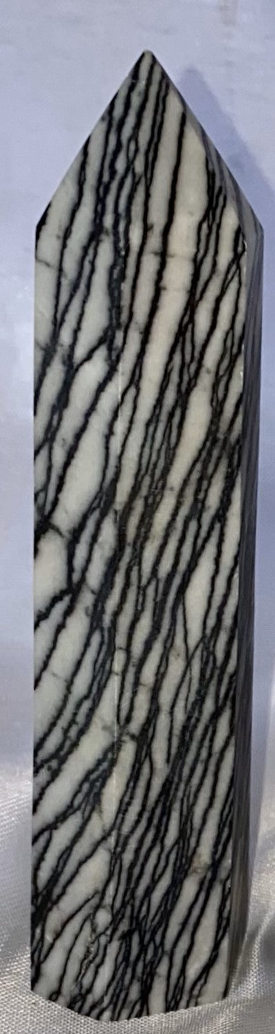 Spiderweb Jasper Point l1  - striped black cream white polished stone sculpture