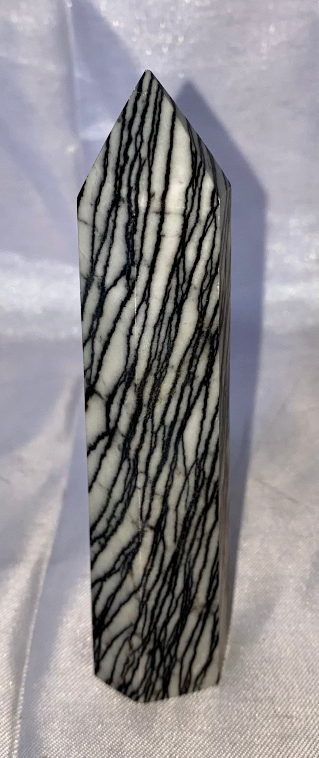 Spiderweb Jasper Point l1  - striped black cream white polished stone sculpture