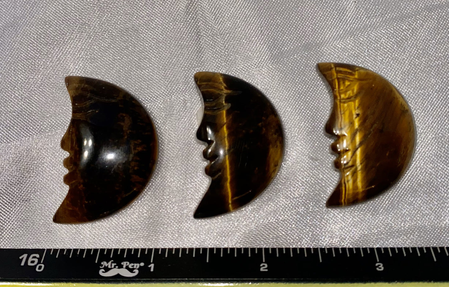 Tiger Eye Crescent Moon Face Figurine 1,2,3 - polished stone sculptures with flash