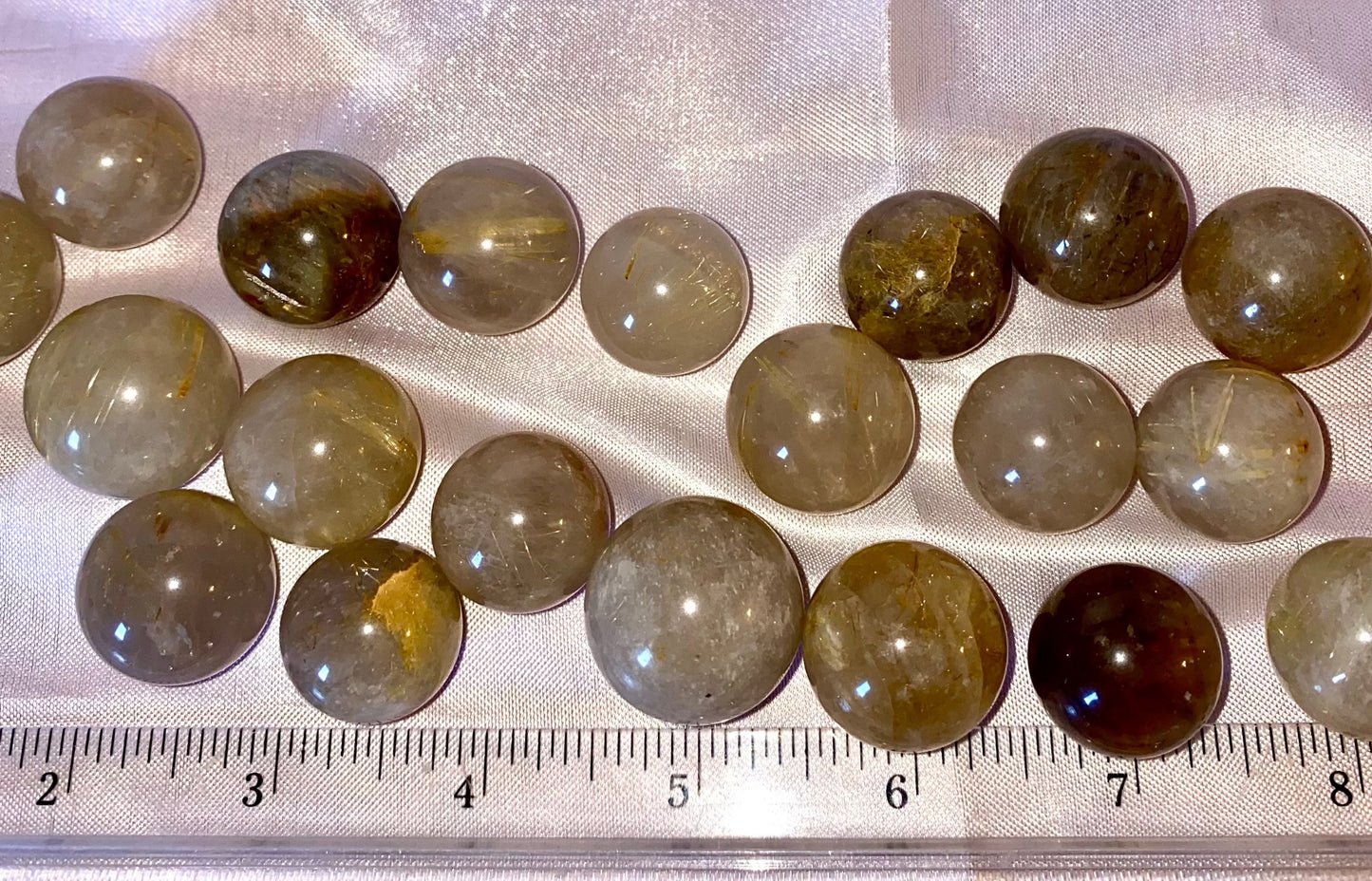 Rutilated Quartz Spheres tl - golden threads in clear quartz polished crystal sculptures