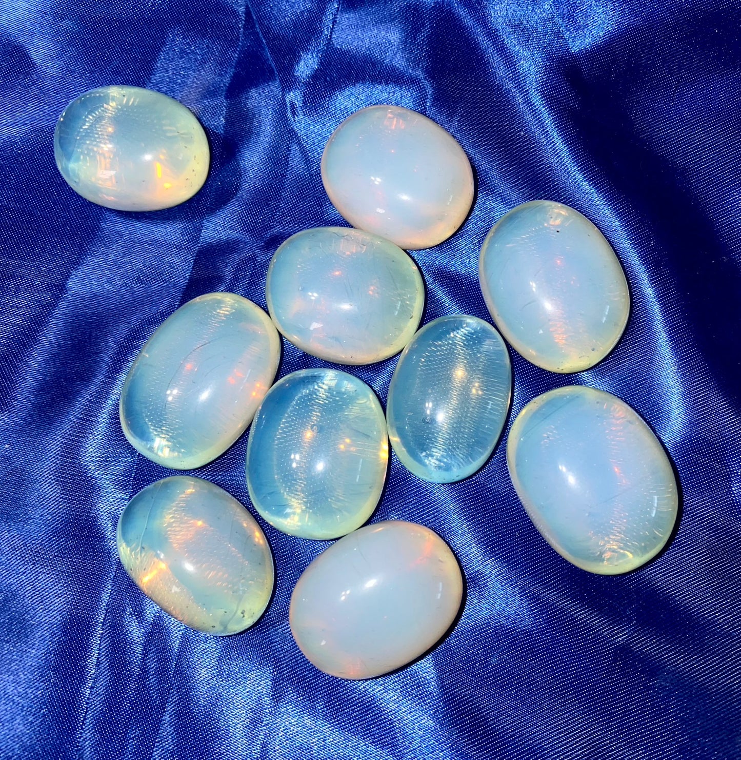 Opalite Palm Stone 1...10 - opalescent flash stone sculpture