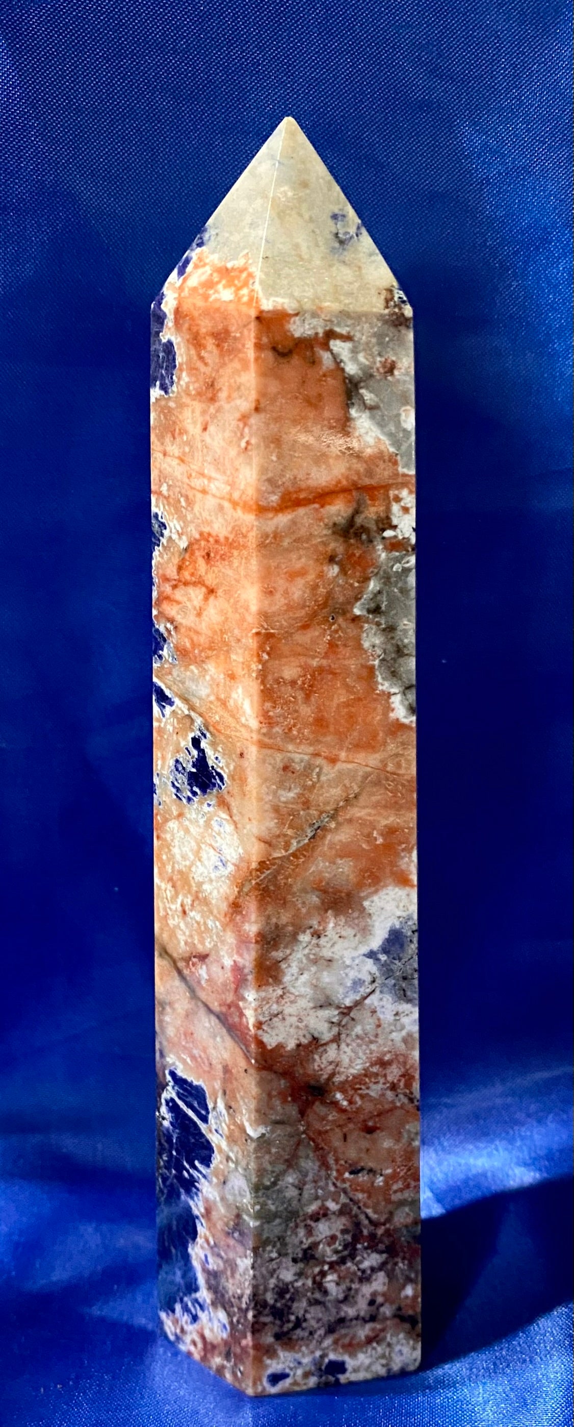 Sunset Sodalite Tower - Brilliant orange and blue polished stone sculpture