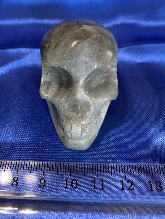 Labradorite Skull Figurine - polished blue gold flash Halloween decor, spooky polished stone sculpture