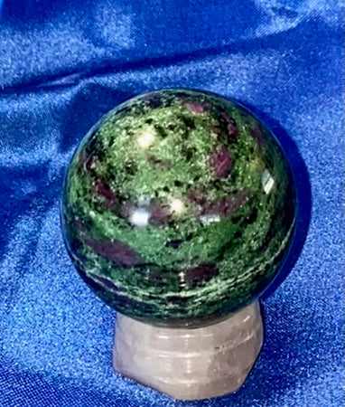 Ruby in Zoisite Sphere (UV Reactive) - polished green red black stone sculpture glows red in blacklight