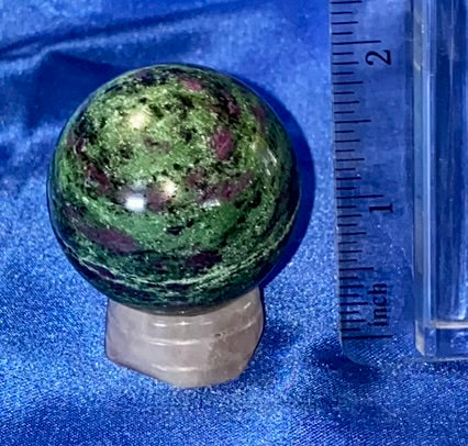 Ruby in Zoisite Sphere (UV Reactive) - polished green red black stone sculpture glows red in blacklight