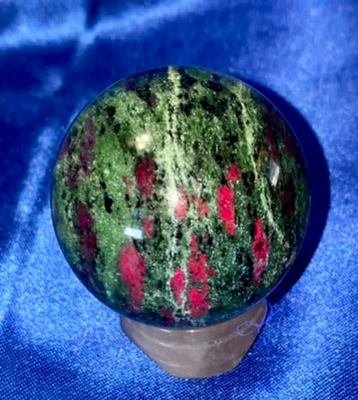 Ruby in Zoisite Sphere (UV Reactive) - polished green red black stone sculpture glows red in blacklight