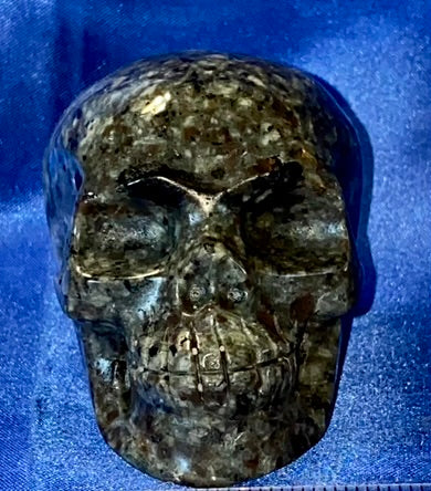 Yooperlite Stone Skull 2 (UV Reactive) - Halloween decor, spooky polished gray black stone sculpture glows red under blacklight