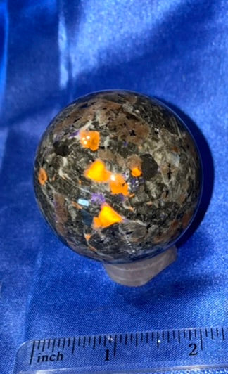 Yooperlite Sphere s1 (UV Reactive) - polished gray black stone sculpture glows red in blacklight