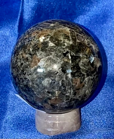 Yooperlite Sphere s2 (UV Reactive) - polished gray black stone sculpture glows red under blacklight